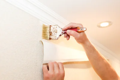 Pose de papier peint à la Roche-Canillac — revêtements muraux et toiles de verre